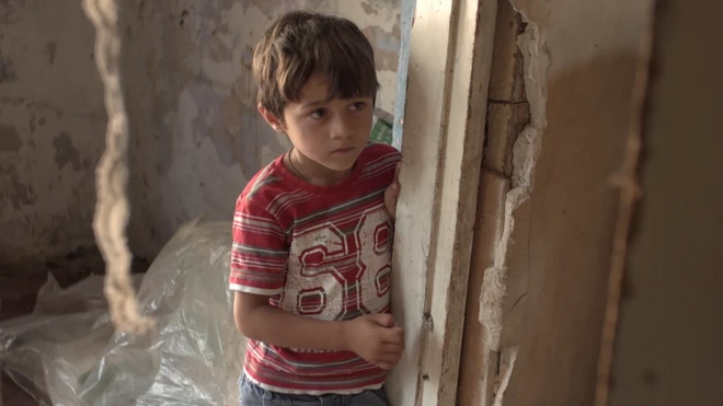 Алекс, наймолодший син у ромській родині з 13 дітьми, у власному будинку, Харків, липень 2018 року