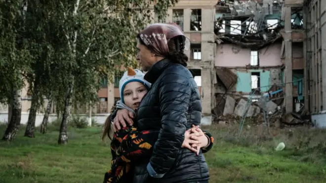 жінка з дитиною