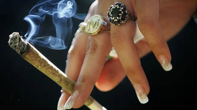 woman smoking marijuana