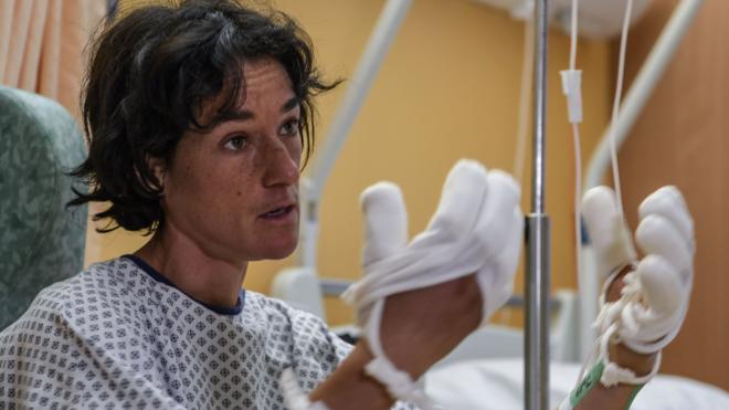 French mountaineer Elisabeth Revol talks to journalists in a French hospital