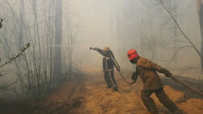 Firefighters in the Chernobyl exclusion zone 10 April