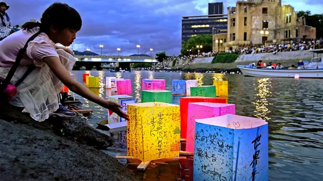 Lanterns float on a river in Hiroshima
