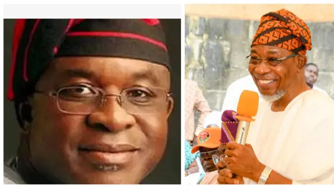 Aworan aarẹ ile igbimọ aṣofin Naijiria tẹlẹ; David Mark ati Ọgbẹni Rauf Aregbesola; gomina ipinle Osun tele. David Mark de fila dudu to ni ila pupa tẹẹrẹ, o logo si oju rẹ, o si n rẹrin-in muse. Ọgbẹni Aregbesola wọ agbada, o de fila, o mu ẹrọ gbohun-gbohun dani, o si n rẹrin-in. Awọn eeyan wa nitosi rẹ ninu aworan naa