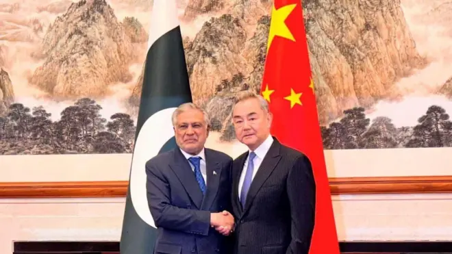 Pakistan's Deputy Prime Minister and Minister for Foreign Affairs Senator Mohammad Ishaq Dar meets with Chinese Foreign Minister Wang Yi, at the Diaoyutai State Guesthouse in Beijing, China, March 31, 2026.
