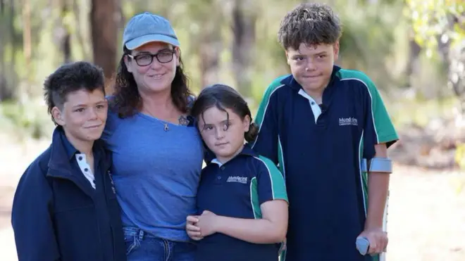 Joanne and Austin with Beau, 12, and Grace, eight 
