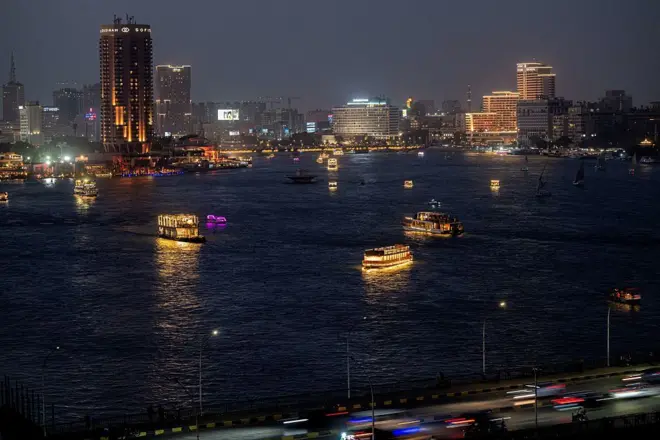 Boats sails along the Nile River in the Egyptian capital Cairo.