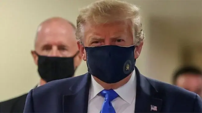 America President Donald Trump use face mask for public for di first time