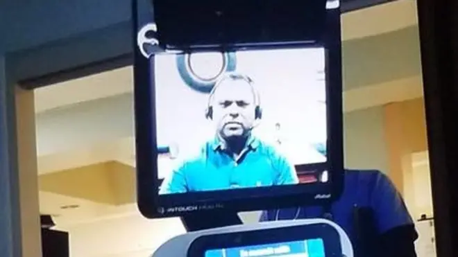 The doctor delivered the news through a video robot