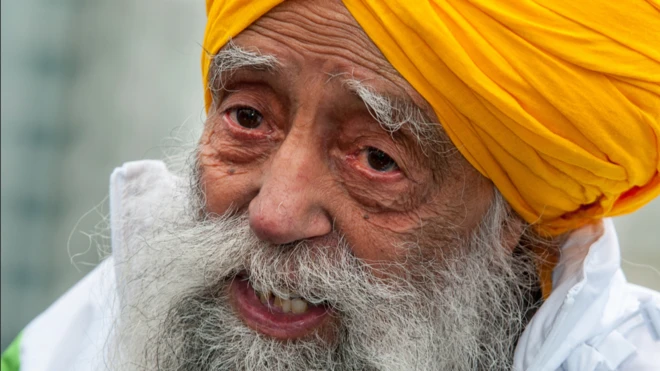  Fauja Singh, 101-years-old, talks to the media at a press conference ahead of the 2013 Hong Kong Marathon on February 21, 2013 in Hong Kong. 