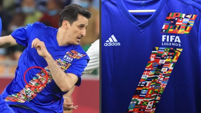 السعودي نواف التمياط مرتديا قميص المباراة ويبدو كما لو أنه قام بـ"طمس" علم إسرائيل