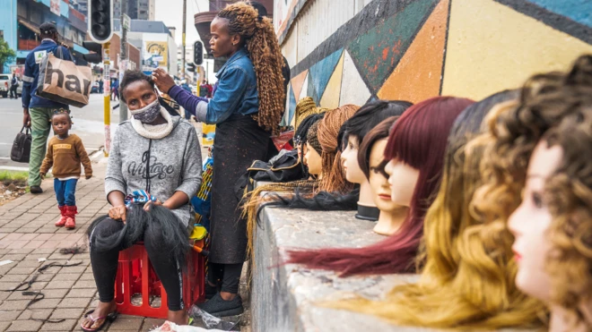 A street hairdresser in Hillbrow, Johannesburg, South Africa