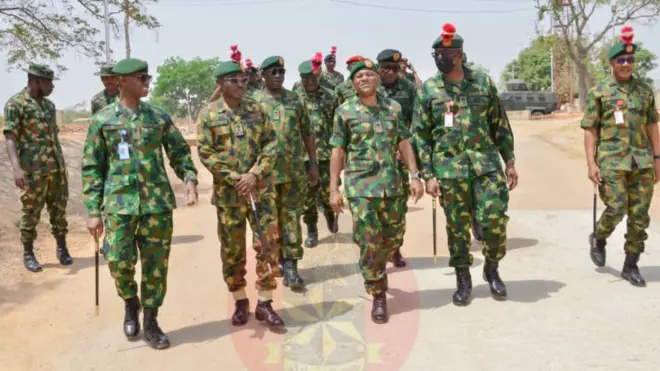 Military men dey waka