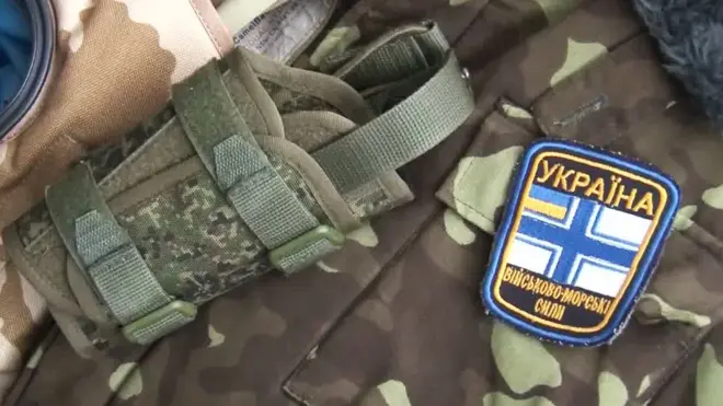 В квартире одного из задержанных была обнаружена экипировка с шевроном Военно-морских сил Украины