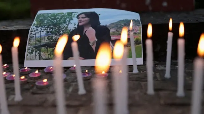 A photo of Mahsa Amini is pictured at a meeting organised by students and activists from Delhi University in New Delhi, India