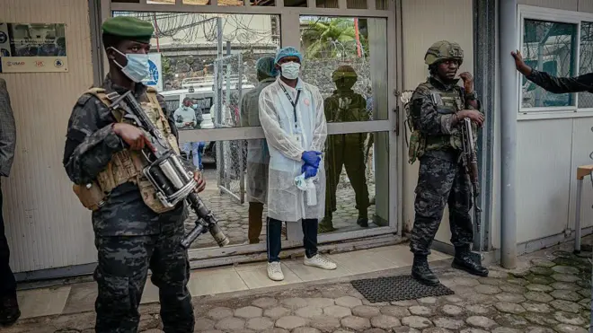 M23 soldiers provide security for di movement authorities for di Rodolphe Mérieux Laboratory, National Biomedical Research Institute (INRB) in Goma, on May 19, 2026 during dia guided visit to di laboratory responsible for analyzing and handling suspected Ebola cases