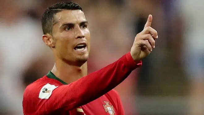 Portugal's Cristiano Ronaldo reacts while a incident is reviewed by the Video Assistant Referee