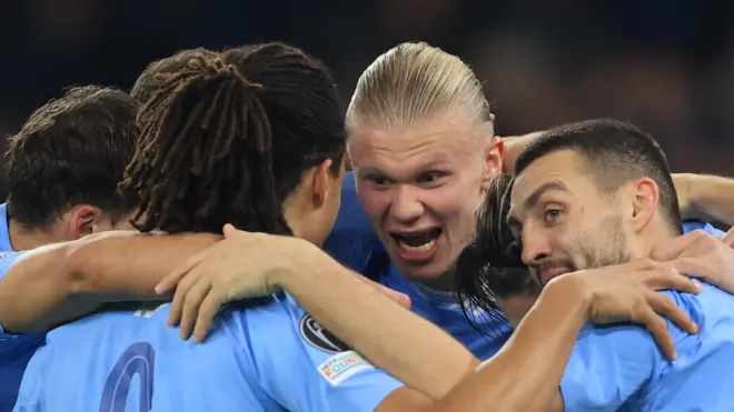 Erling Haaland celebrates scoring Man City's third goal against Young Boys
