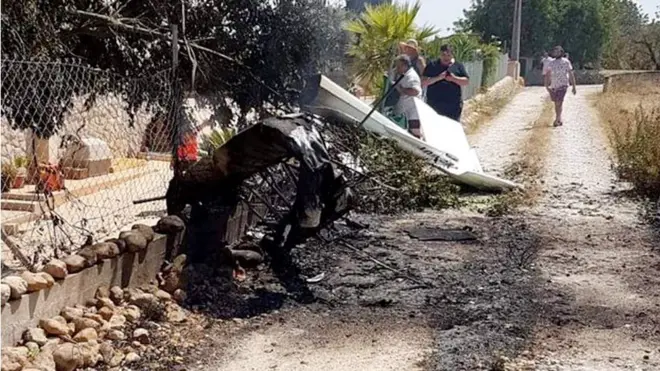 The wreckage of the plane landed on a road