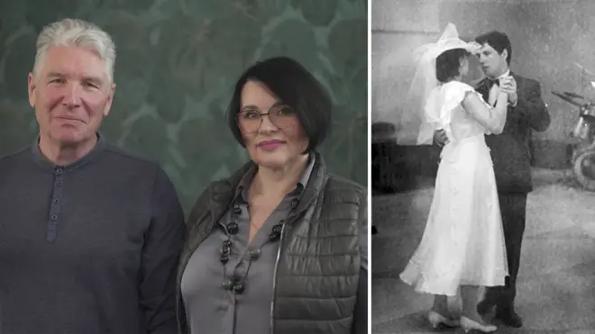 A composite image shows married couple Iryna and Serhiy photographed in 2026, looking at the camera and smiling. Iryna has chin-length dark hair and glasses and is holding a pink flower. Serhiy has grey hair and is holding up a photo of them side-by-side at their wedding. On the right hand side is a black and white photograph of the couple during their first dance at their wedding. She wears a white wedding dress, he wears a dark suit and a bow tie. 