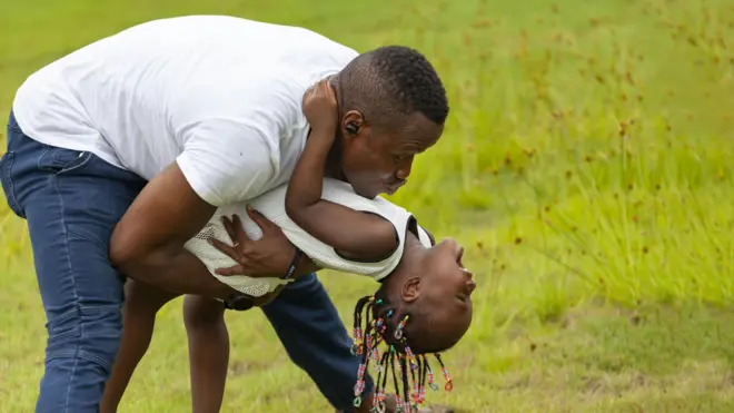 Father play with daughter