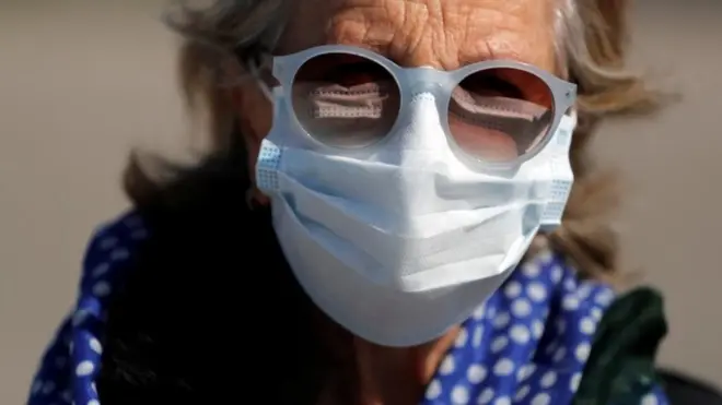 Israeli woman wears mask in Haifa