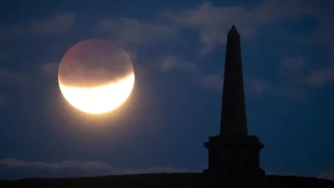 Mostly clear skies also allowed the partial lunar eclipse to be seen from Stoodley Pike in West Yorkshire