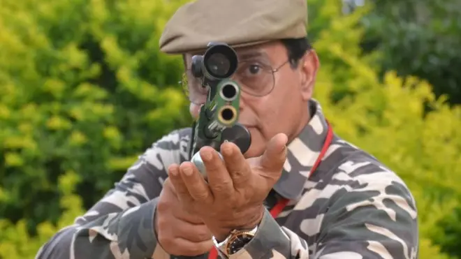 Sharp shooter Nawab Shafath Ali Khan taking a aim