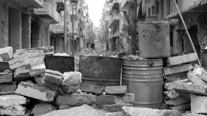 A barricade in one of the abandoned, shattered districts of what used to be the rebel-held eastern side of Aleppo