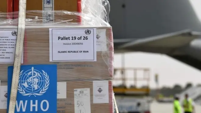 Tonnes of medical equipment and coronavirus testing kits provided bt the World Health Organisation are pictured at the al-Maktum International airport in Dubai on March 2, 2020