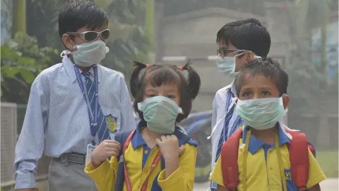 hildren wear mask at Vasundhara, Sector 11on October 31, 2019 in Ghaziabad, India