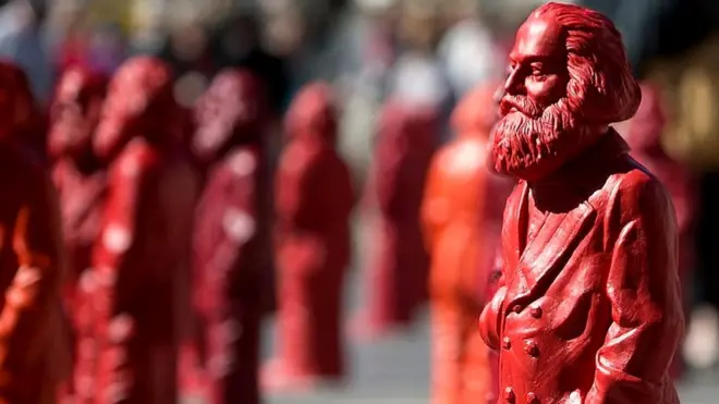 Estatuascaça niquel bonusCarlos Marx en Tréveris, Alemania