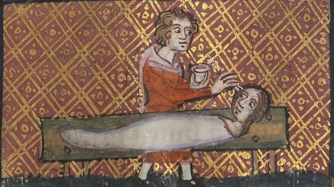 ภาพประกอบจากหนังสือ Roman de la Rose เล่าถึงตำนาน "พิกเมเลียน" ประติมากรที่ล้มป่วยด้วยไข้ใจเพราะหลงรักรูปปั้นหญิงงามที่ตนเองสร้างขึ้น