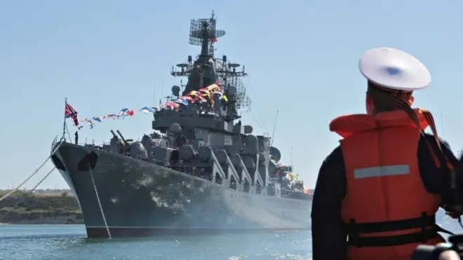 A sailor looks at the Russian missile cruiser Moskva moored in the Ukrainian Black Sea port of Sevastopol, Ukraine 10, 2013