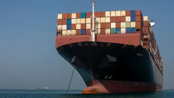  A ship remains anchored on May 16, 2026 in the Strait of Hormuz near Larak Island, Iran