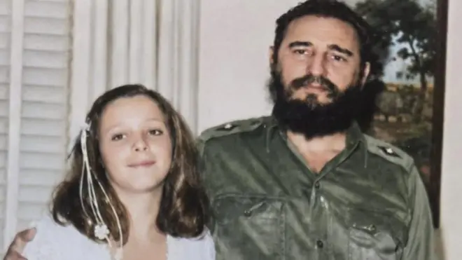 The late Cuban leader Fidel Castro, wearing a green military uniform, is seen alongside his daughter, Alina Fernandez, in a photo taken in the 1960s.