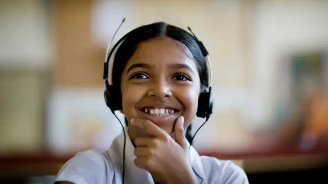 Sri Lankan Girl with headphones.