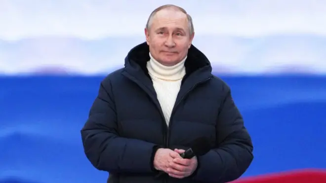 Russian President Vladimir Putin attends a concert marking the eighth anniversary of Russia"s annexation of Crimea at Luzhniki Stadium in Moscow, Russia March 18, 2022.