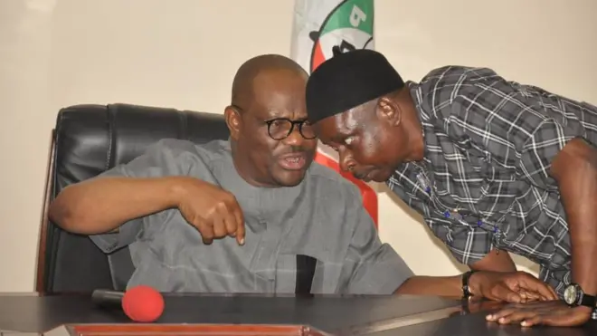 Guvnor Wike and di SDP Deputy Guvnorship Candidate Christopher Udume wey just defect