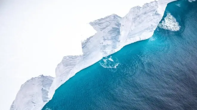 This cliff face is 30m high, but the berg probably reaches under water for 200m