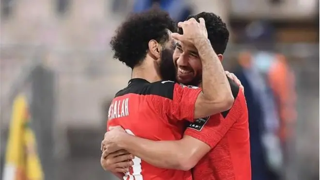 Mo Salah and im colleague hug