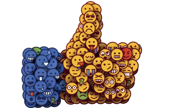 Mano con pulgar hecha de emoticones