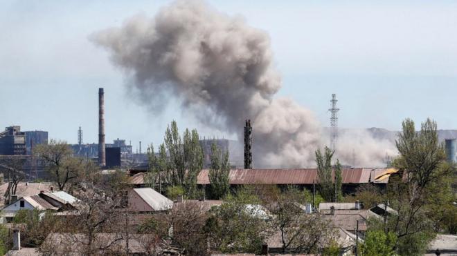 A view shows an explosion at a plant of Azovstal Iron and Steel Works during Ukraine-Russia conflict in the southern port city of Mariupol, Ukraine May 8, 2022.