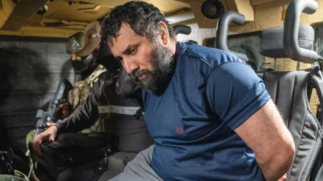 Adolfo Macias Villamar 'Fito' (R) dey guarded as e move for Guayaquil, Ecuador, 25 June 2025