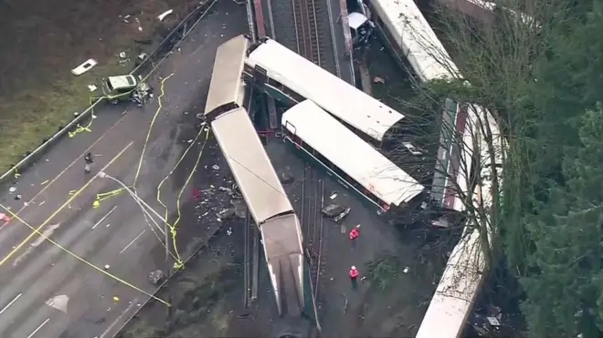 Aerial images show the carriages on both sides of the track