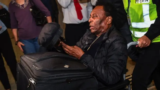 Pele in a wheelchair as he arrives at Sao Paulo's international airport in September 2019