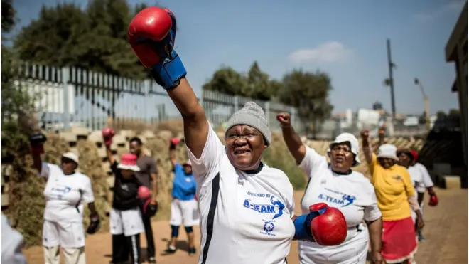 A group of South African grandmothers, the 'Boxing Grannies' take part in a boxing training