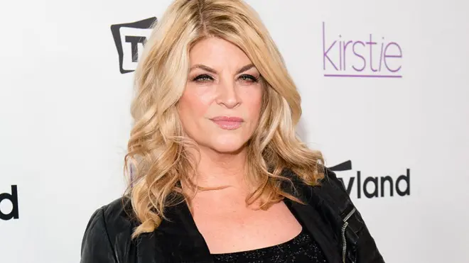 Kirstie Alley on a red carpet in 2013