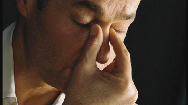 Homem com expressãobetpix 365 bônusexaustão