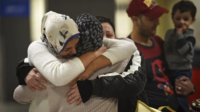 Iraqi family reunited at Washington Dulles Airport on Sunday (5 Feb)