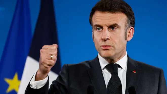 France's President Emmanuel Macron gestures as he addresses the media during a press conference at the end of a Special European Council to discuss continued support for Ukraine and European defence at the EU headquarters in Brussels on March 6, 2025. 